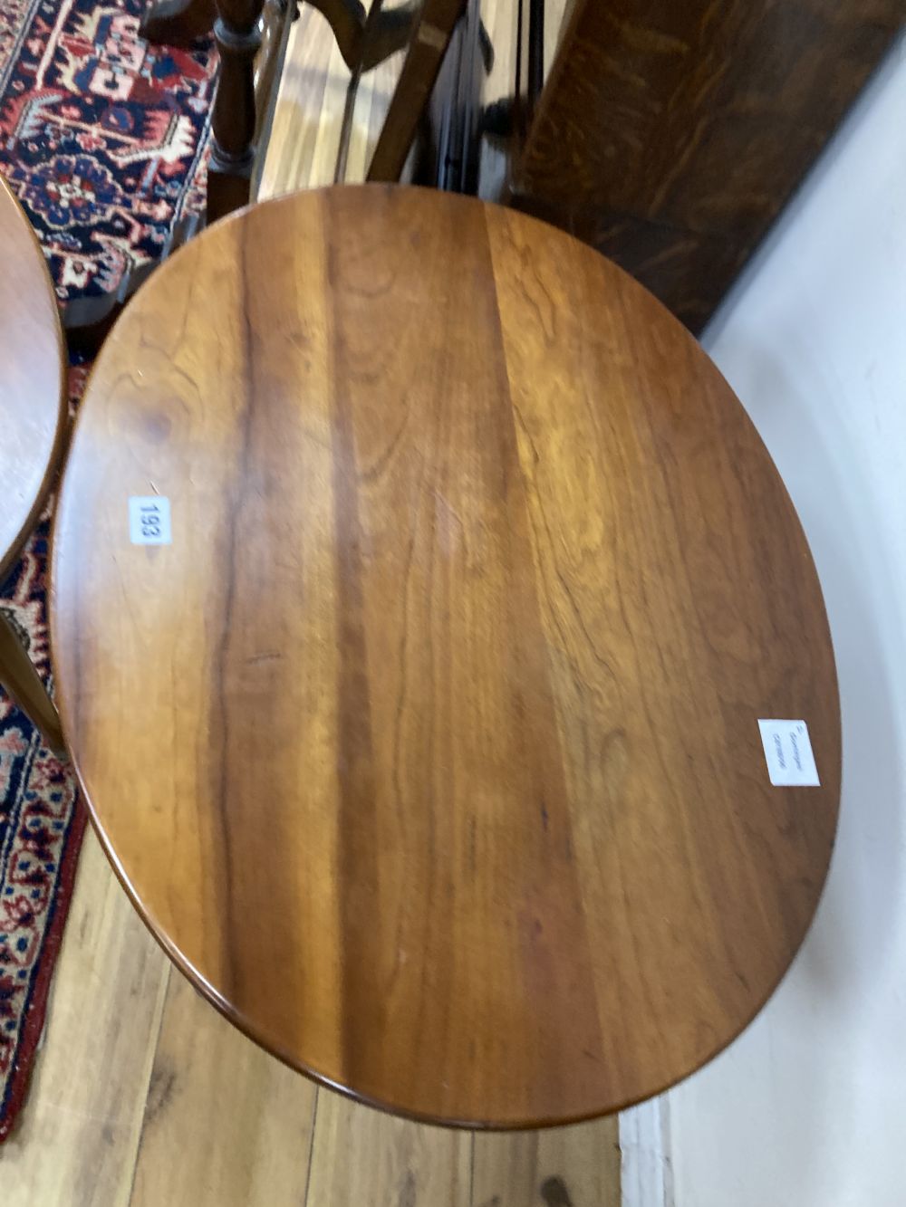 A pair of Leopold Stickley cherrywood side tables, width 65cm depth 49cm height 58cm